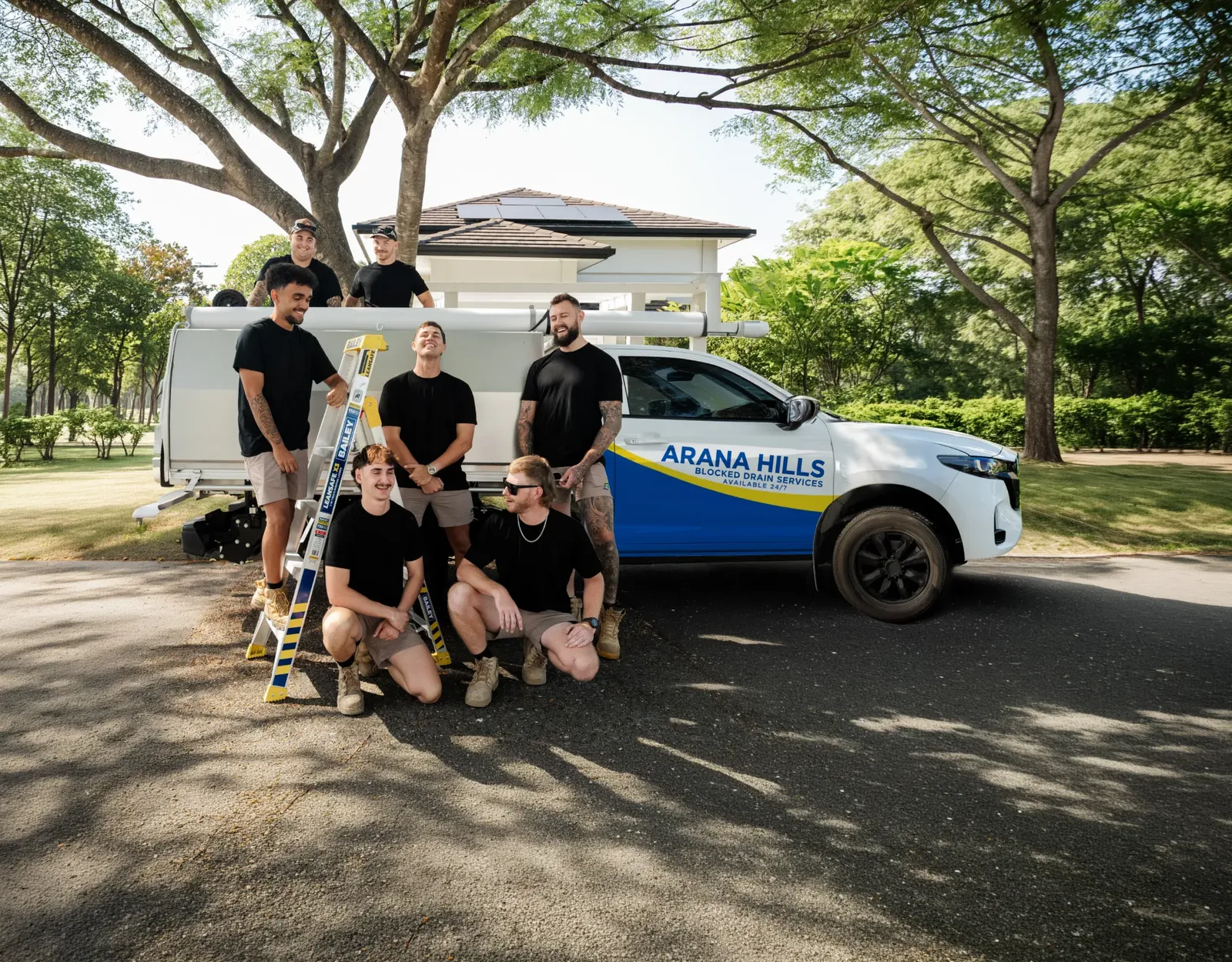 Arana Hills Blocked Drain Services team and ute