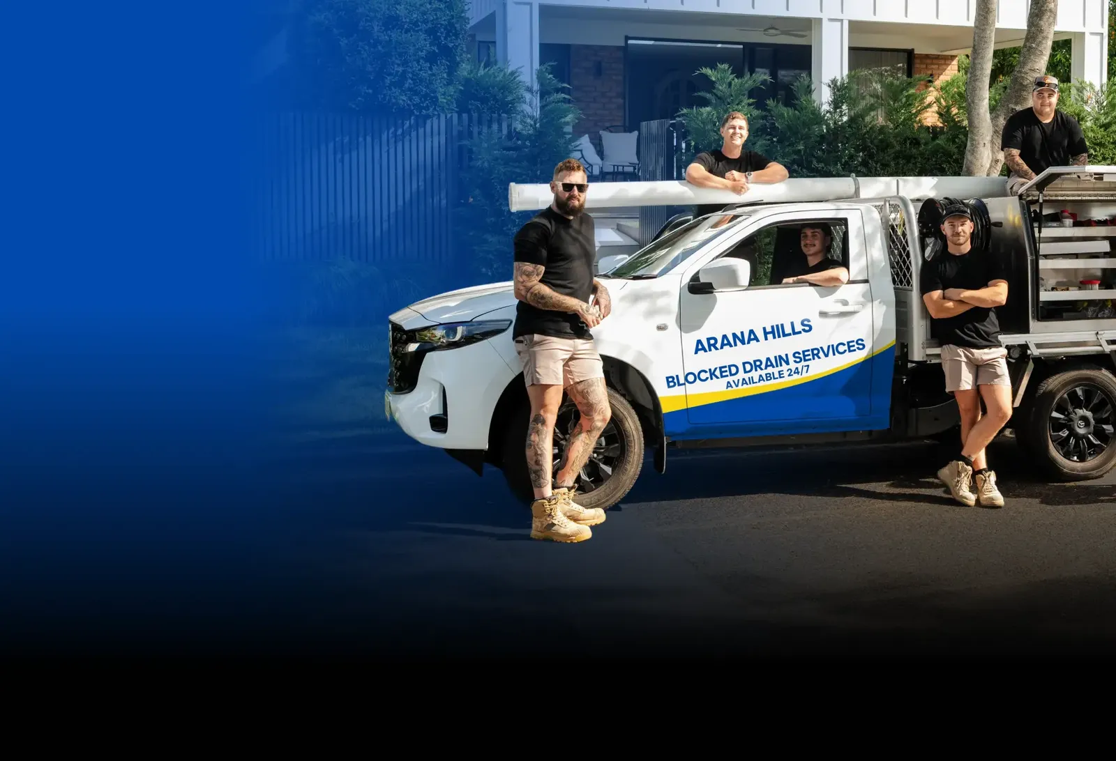 Arana Hills Blocked Drain Services team with the ute